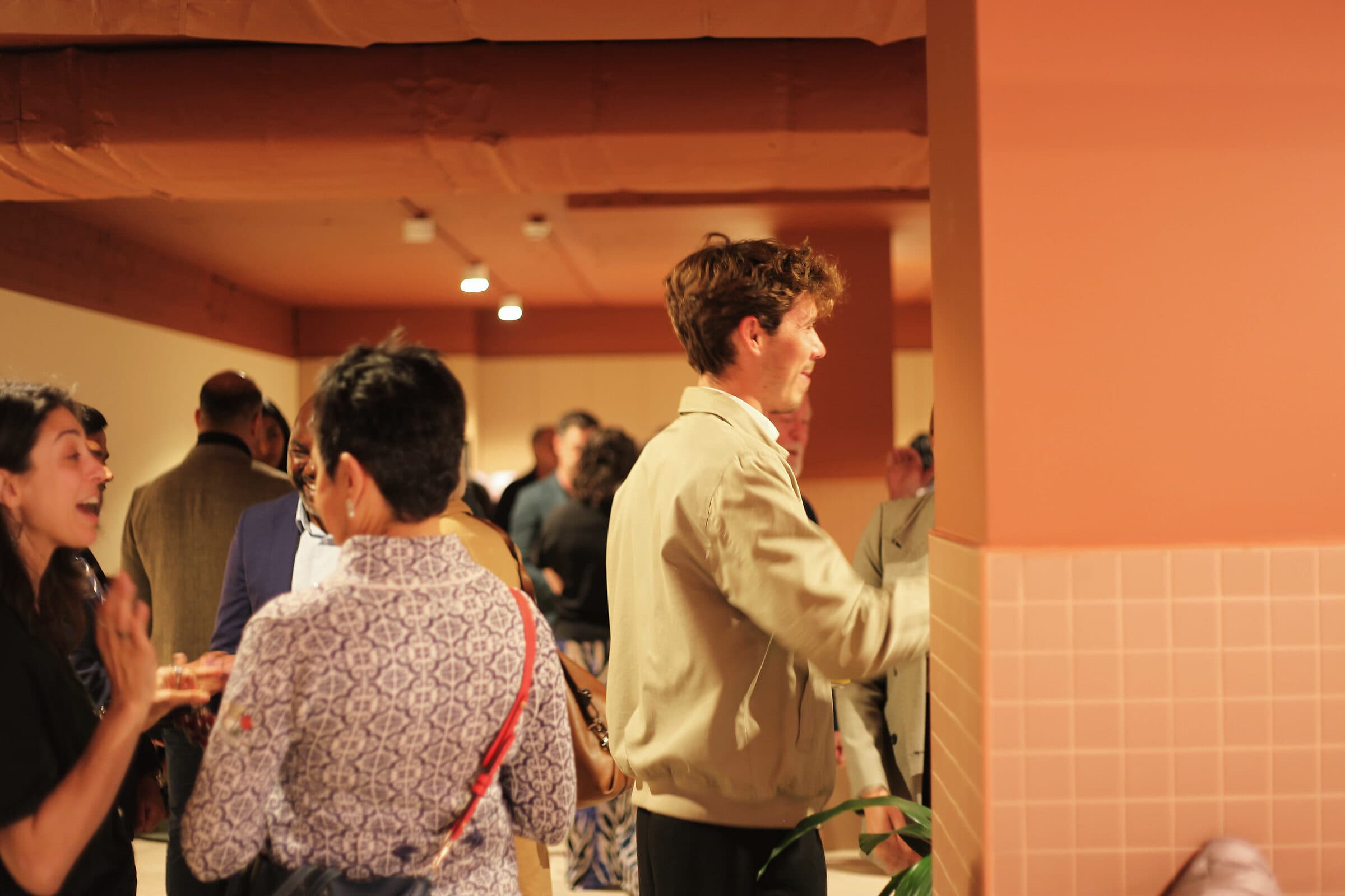People swapping introductions at an evening at Workspace by black vc