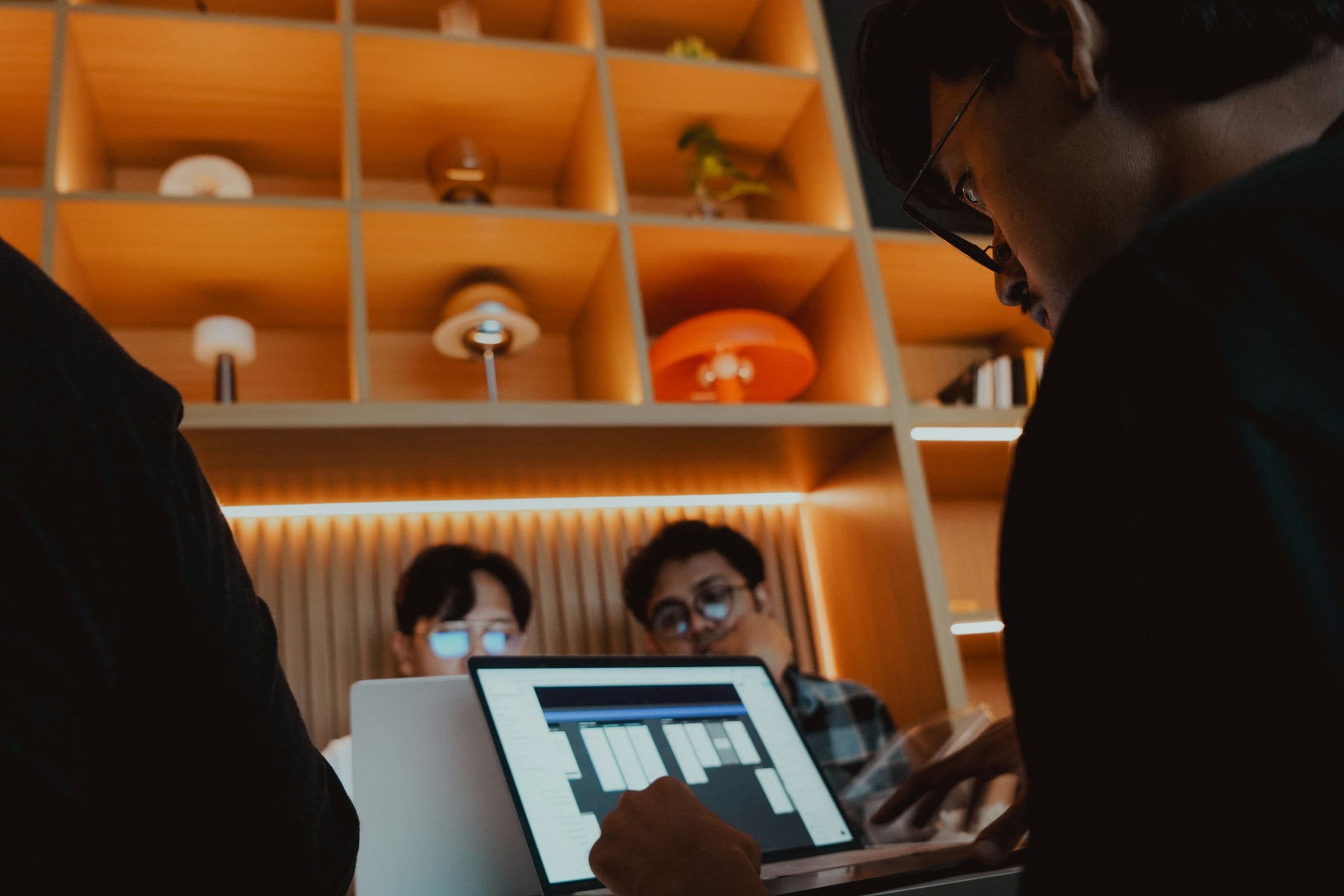 Design team collaborating in a studio workspace